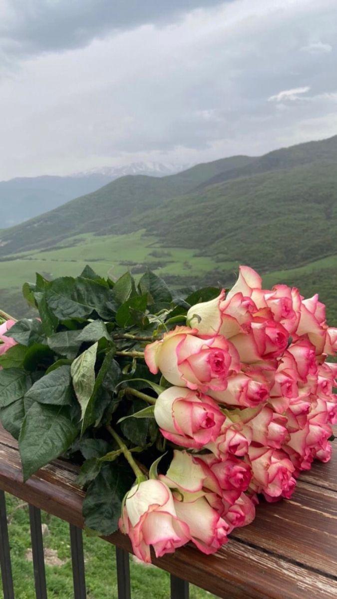 Professional floral arrangement in modern corporate setting